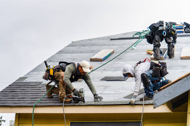 Professional Roof Replacement technician working in Union City, IN